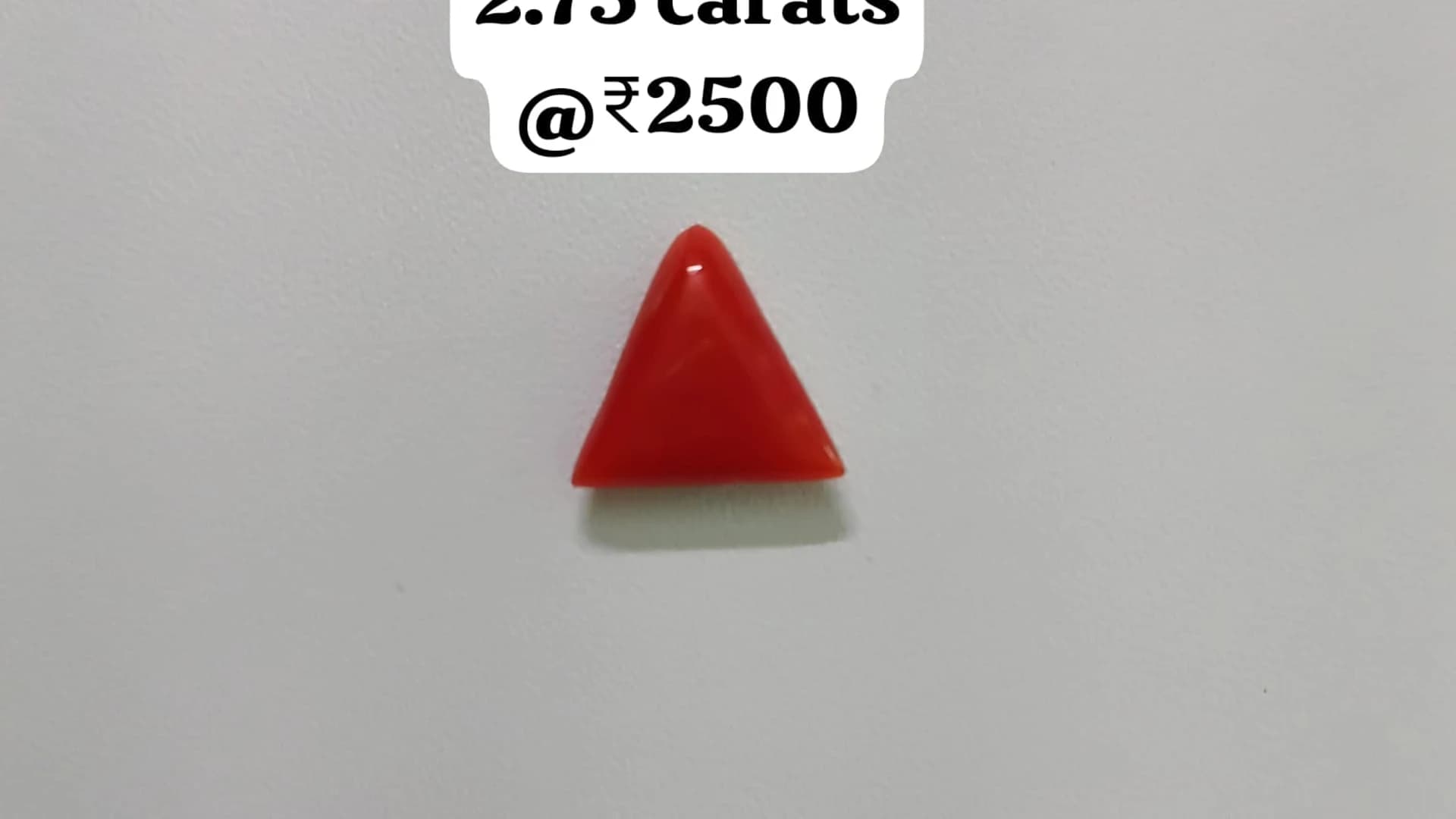 Sacred Triangular Coral — vibrant scarlet triangular cabochon